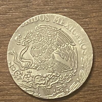 Mexico.50Cents.1975.sobre.cospel.de.20.Cents.Error